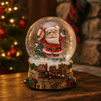 Sfera d'acqua con Babbo Natale  con regalo e carillon