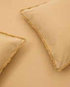 Set Sifinia copripiumino e federa 100% cotone percalle con frange mostarda letto 150 cm