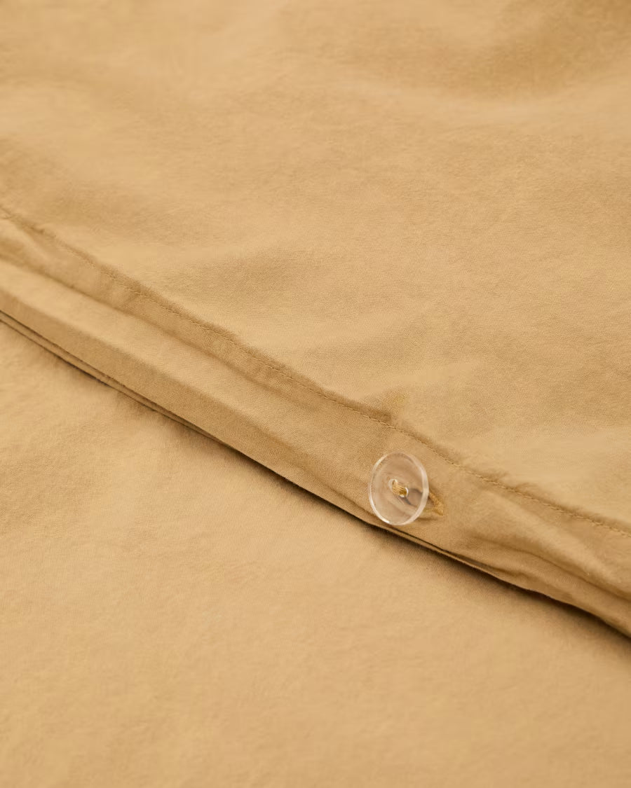 Set Sifinia copripiumino e federa 100% cotone percalle con frange mostarda letto 180 cm