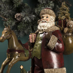Statuetta babbo natale con sacco in resina per decorazioni natalizie