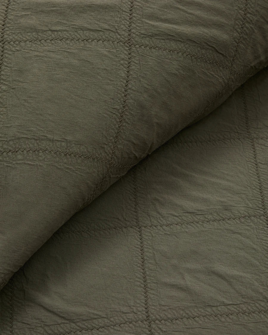 Copriletto Serla in ciniglia verde 100% cotone con rombi per letto 150/160 cm.