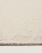 Tappeto Selira in lana beige con effetto ricamato 300 x 200 cm