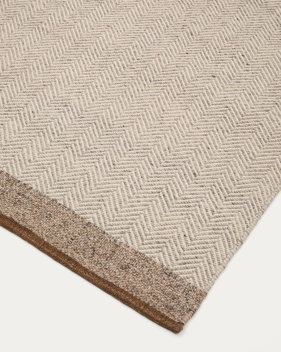 Tappeto Nifelia jacquard in lana beige 200 x 300 cm