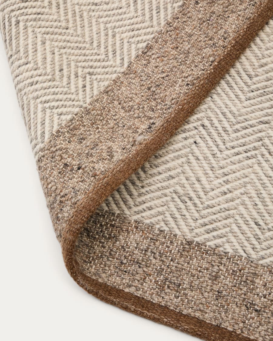 Tappeto Nifelia jacquard in lana beige 200 x 300 cm