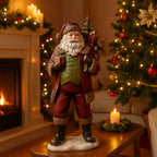 Statuetta babbo natale con sacco in resina per decorazioni natalizie