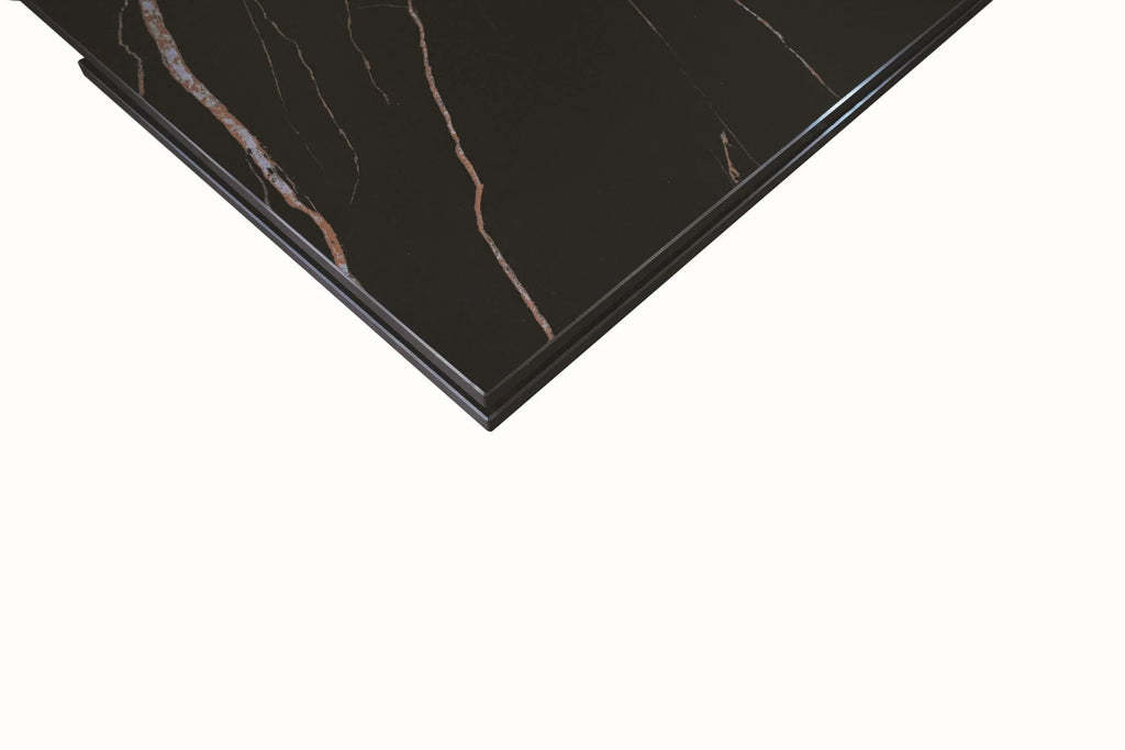 Tavolo FIGARI in vetroceramica matt golden nero con gambe a X in metallo bronzo, allungabile