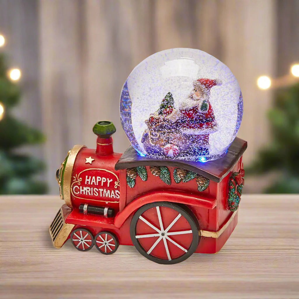 Sfera con Babbo Natale in Trenino con  Carillon  h 17 cm